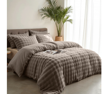Sleeptime Teddy Pom Pom Dekbedovertrekset in taupe.
